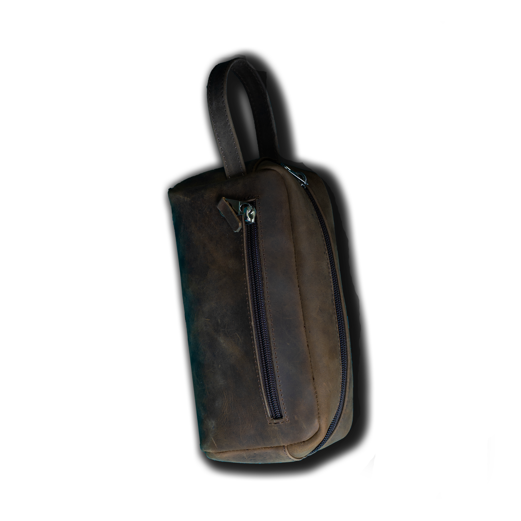 Brown bag upside down X Traveler Toiletry Leather Bag - Image 1